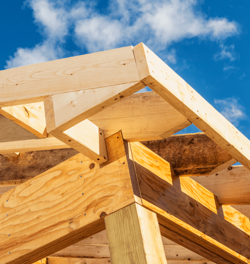 Wooden roof structure under construction.