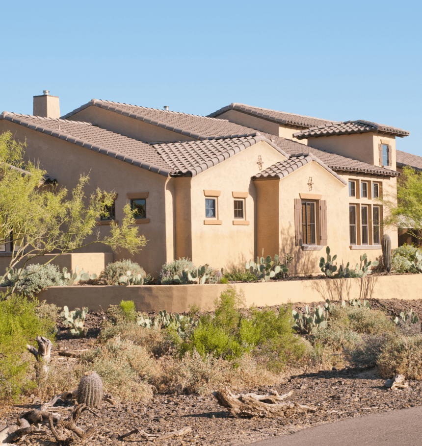 Desert Southwestern-style home with cacti.